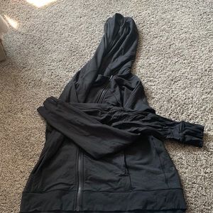 Black zip up Lululemon hoodie size 12